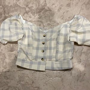 This is a sense mill button up blouse.